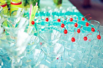 Fotobehang Eetkamer Glasses decorated with cherry for alcoholic beverages cocktails at the Banquet  © edwardderule