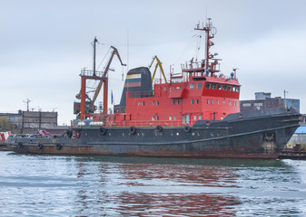 The fishing vessel on a mooring in a bay