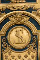  Heraldic motifs on front door to Les Invalides. Paris, France