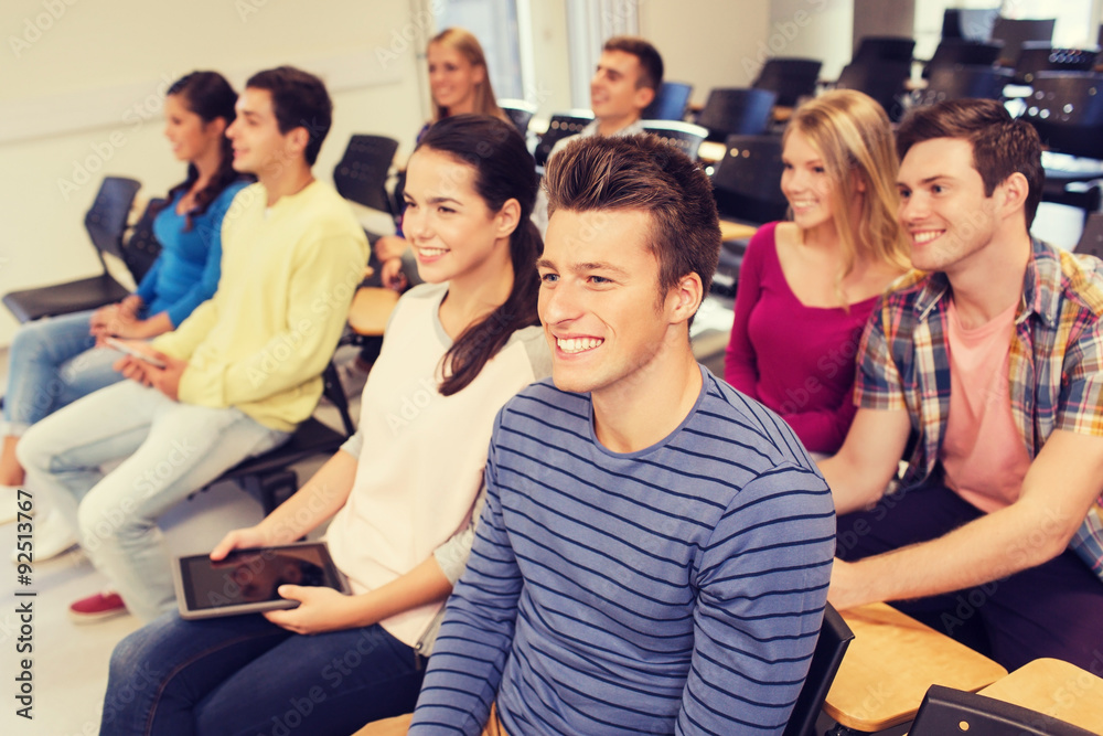 Wall mural group of smiling students with tablet pc