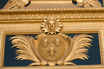  Heraldic motifs on front door to Les Invalides. Paris, France