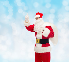 man in costume of santa claus with bag