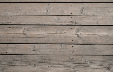 Fototapeta na wymiar Vintage wooden panel with horizontal planks and gaps