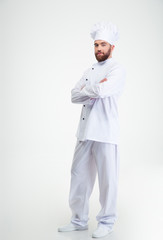 Male chef cook standing with crossed hands