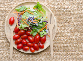 Organic Salad on wooden plate