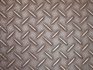 Background of metal diamond plate in brown silver color