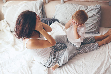 Mom relaxing with her little son