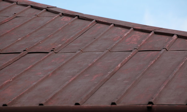 Bad condition metal roof surface.