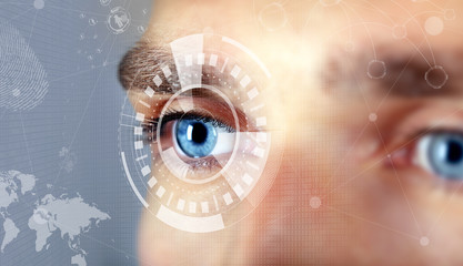 Human eye viewing digital information. Cyber technology concept