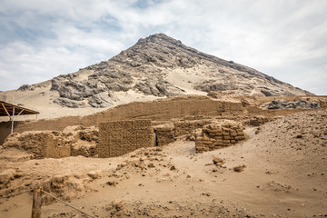 Temple of the Sun (Huaca del Sol). Large historic adobe temple from the Moche culture located close to Trujillo in Peru.