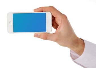 Hand holding smart phone with blue screen, isolated on white