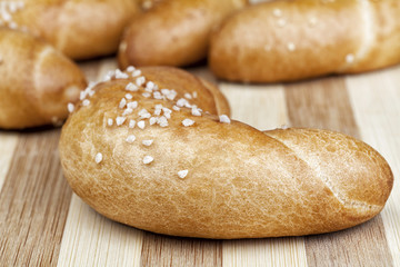 Macro photo of fresh homemade rolls. Studio shot, Photographed on wooden table.