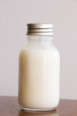 White unlabelled cream bottle