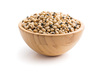 uncooked beans in wooden bowl