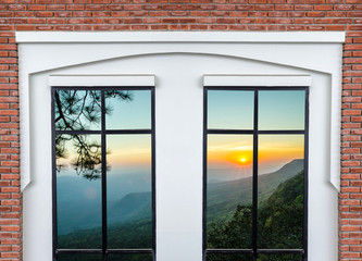 white modern window with brick wall on landscape mountain view background