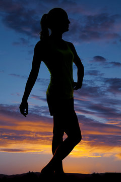 silhouette of a woman fitness posing