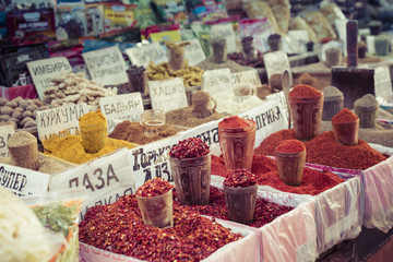 Fototapeta premium Beautiful vivid oriental market with bags full of various spices
