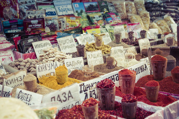 Beautiful vivid oriental market with bags full of various spices