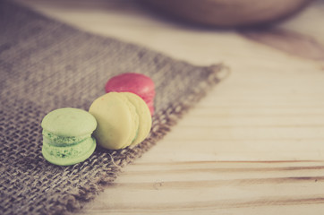rainbow macaroon on wood board