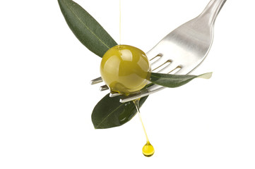 fork with olive and leaves with drop oil