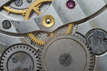 Fototapeta na wymiar Metal Cogwheels in Old Clockwork, Macro.