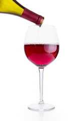 Clear glass and a bottle of red wine