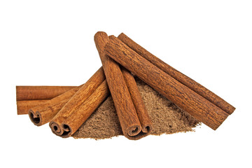 Cinnamon sticks and powder on white background