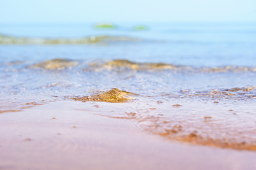 Waves on the sandy beach