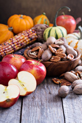 Pumpkins, nuts, indian corn and apples