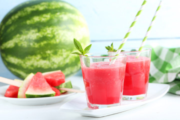 Fresh watermelon juice in the glass on wooden table