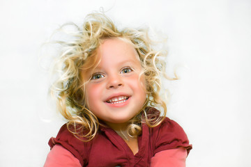 Portrait of a girl. Happy. age 4 years.