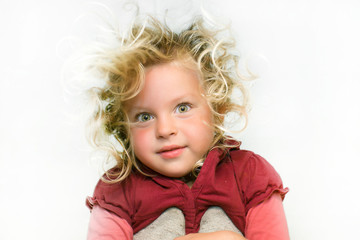 Portrait of a girl. looking at the camera. Age 4 years.