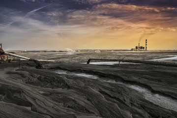A land of ash. Hundreds of square miles covered with lifeless ash. Ash waste is produced by burned...