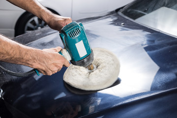 Obraz premium Car polishing series : Polishing blue car