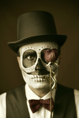 man with calaveras makeup, vintage effect