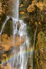 Fototapeta na wymiar Waterfall with rainbow in national park Plitvice, Croatia
