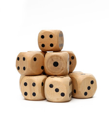 Wooden Dice on a White Background
