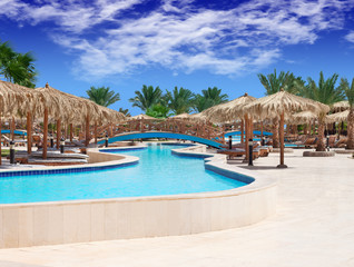 Tropical swimming pool at resort