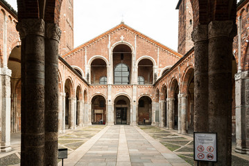 The entrance of the "Basilica di Sant'Ambrogio" with a portico (Milan, Italy)