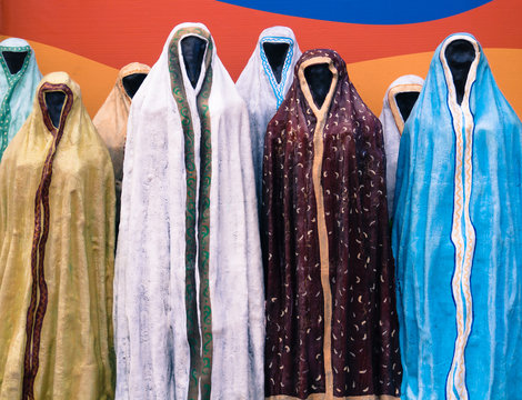 mannequins wearing robes ,chadors, abayas in many colors and patterns to cover women in traditional Muslim fashion on a street in Yaroslavl, Russia
