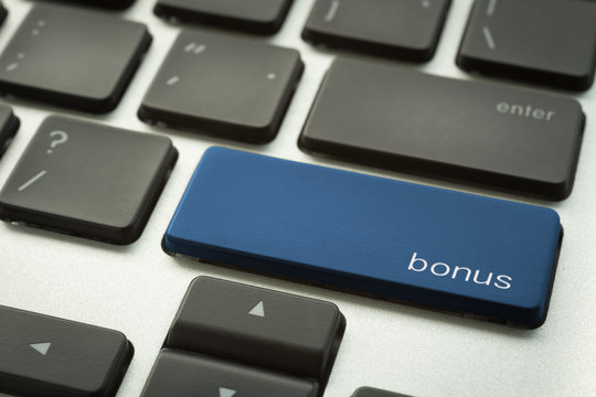 Computer keyboard with typographic BONUS button