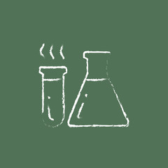 Laboratory equipment icon drawn in chalk.