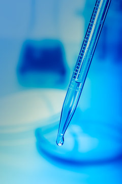 Pipette with drop of water