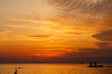 Sea fishing at sunset.