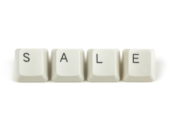 sale from scattered keyboard keys on white
