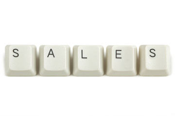sales from scattered keyboard keys on white