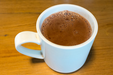 Pure hot chocolate in a white mug
