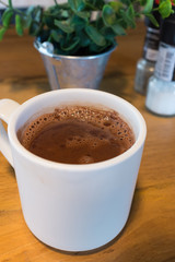 Pure hot chocolate in a white mug