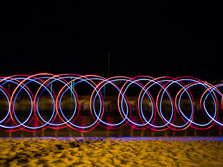 LED light source painting in the sea shore