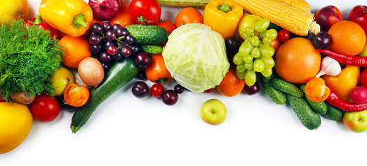 Heap of fruits and vegetables isolated on white